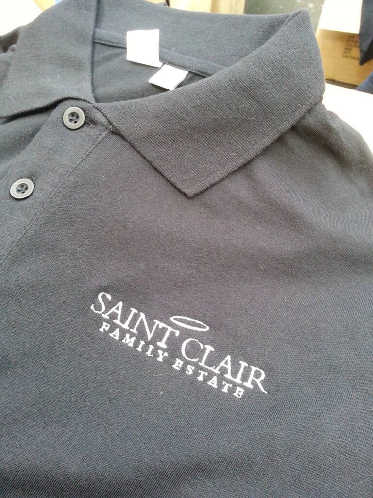 embroidered logo on polo shirt